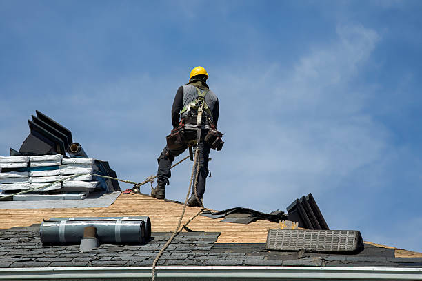 Professional Roofing technician working in Holmes, NY